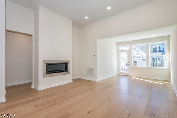 Empty room, Fireplace, Interior, Recessed Lighting, Wood Texture Flooring
