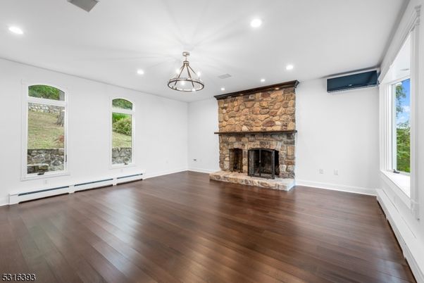 Empty room, Fireplace, Interior, Pendant Lights, Recessed Lighting, Wood Texture Flooring