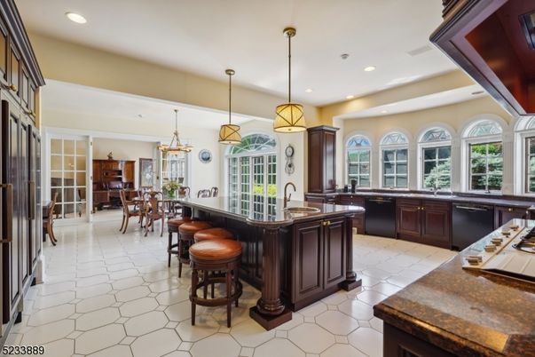 Chandelier, Dining room, Interior, Kitchen, Pendant Lights, Recessed Lighting, Stainless Steel Appliances
