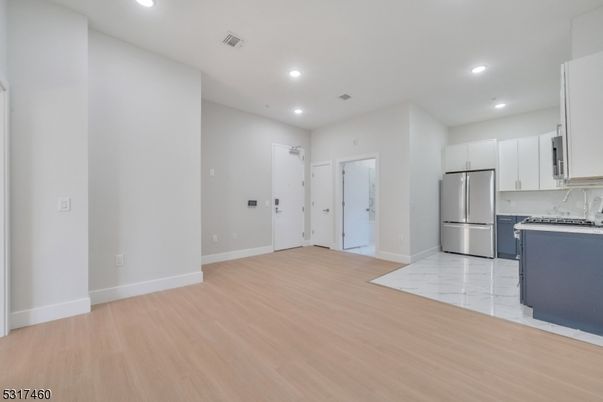 Interior, Kitchen, Marble, Recessed Lighting, Stainless Steel Appliances, Wood Texture Flooring