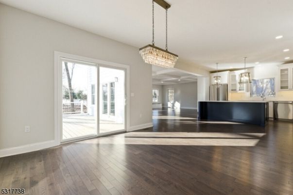 Chandelier, Interior, Kitchen, Pendant Lights, Recessed Lighting, Stainless Steel Appliances, Wood Texture Flooring