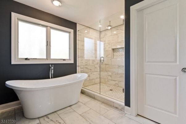 Bathroom, Free Standing Baths, Glass Shower, Interior, Marble Walls, Recessed Lighting