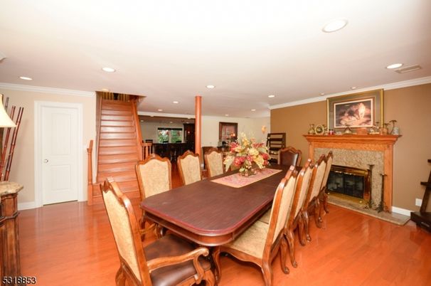 Dining room, Fireplace, Interior, Recessed Lighting, Wood Texture Flooring