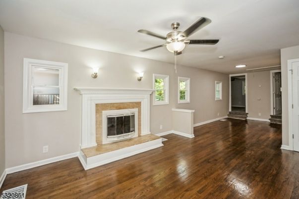 Empty room, Fireplace, Interior, Recessed Lighting, Wood Texture Flooring