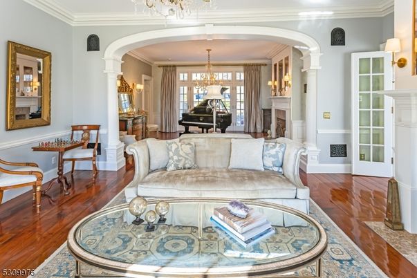 Chandelier, Fireplace, Interior, Living room, Piano, Wood Texture Flooring