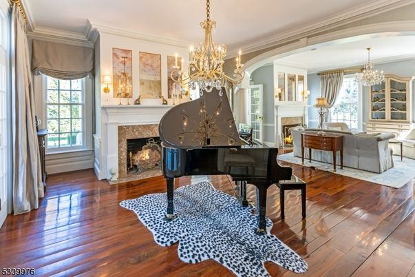 Chandelier, Fireplace, Interior, Living room, Piano, Wood Texture Flooring