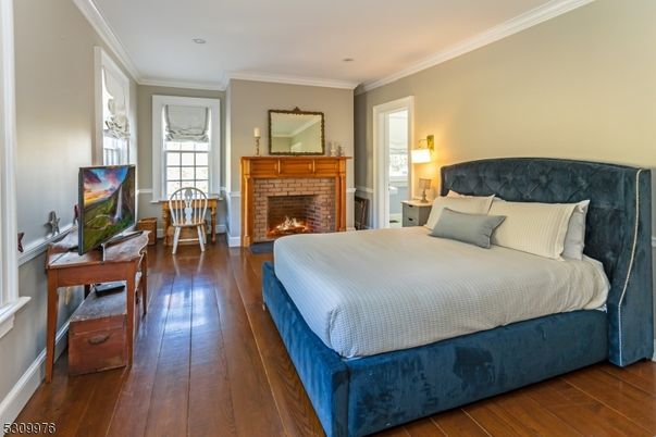 Bedroom, Fireplace, Interior, Recessed Lighting, Wood Texture Flooring