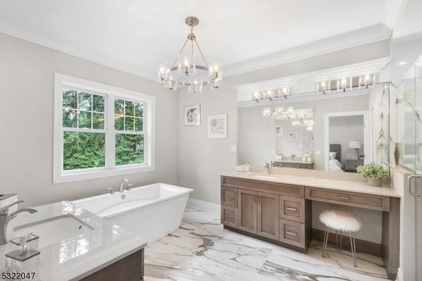 Bathroom, Chandelier, Dual Sink Vanities, Free Standing Baths, Interior, Marble, Pendant Lights