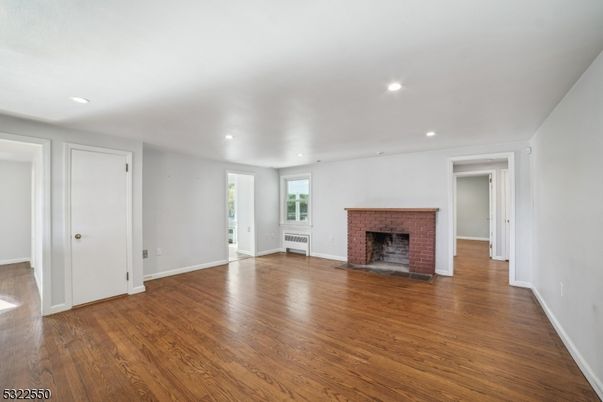Empty room, Fireplace, Interior, Recessed Lighting, Wood Texture Flooring