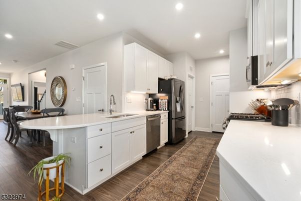 Dining room, Interior, Kitchen, Recessed Lighting, Stainless Steel Appliances, Wood Texture Flooring