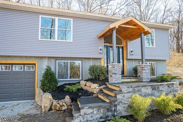 Attached, Exterior, Facade, Raised Ranch