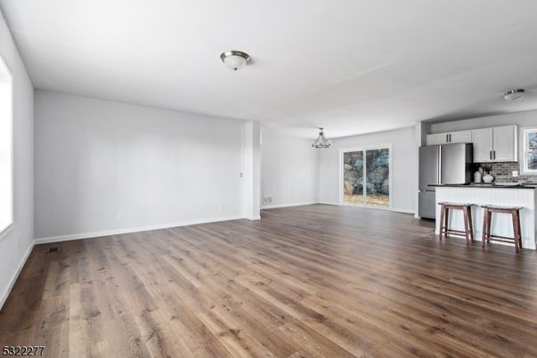 Empty room, Interior, Kitchen, Stainless Steel Appliances, Wood Texture Flooring