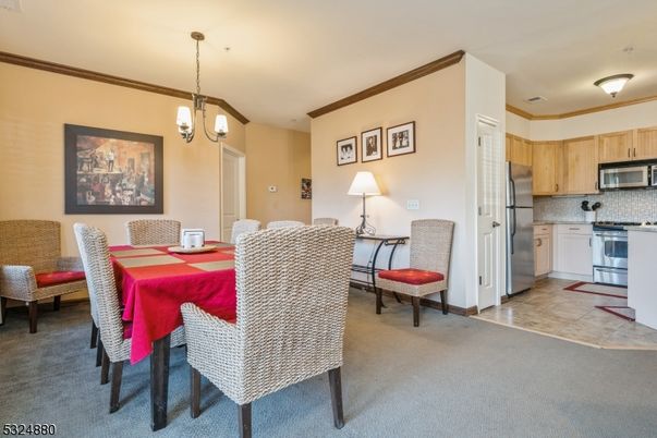 Chandelier, Dining room, Interior, Kitchen, Pendant Lights, Stainless Steel Appliances