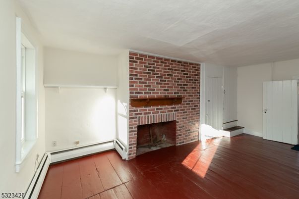 Empty room, Fireplace, Interior, Stone Walls, Wood Texture Flooring