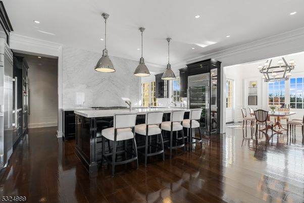 Dining room, Interior, Kitchen, Marble Walls, Pendant Lights, Recessed Lighting, Wood Texture Flooring