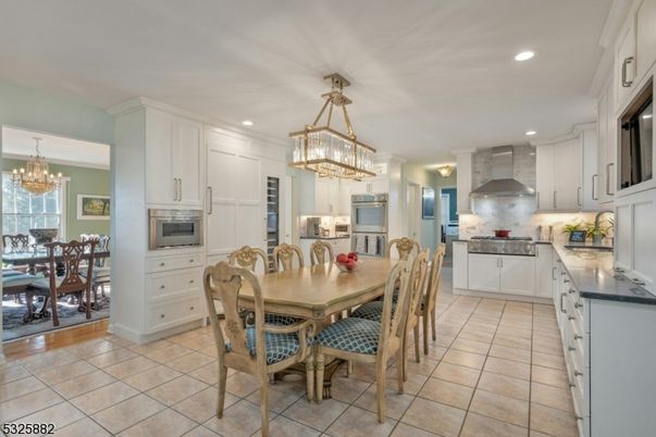 Chandelier, Dining room, Interior, Kitchen, Pendant Lights, Recessed Lighting, Stainless Steel Appliances