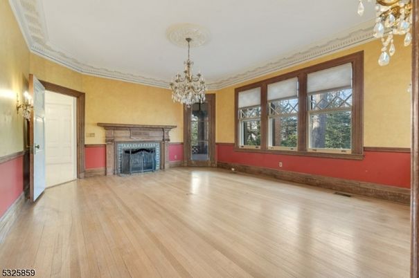 Chandelier, Empty room, Fireplace, Interior, Wood Texture Flooring