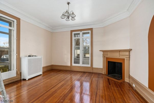 Chandelier, Empty room, Fireplace, Interior, Wood Texture Flooring