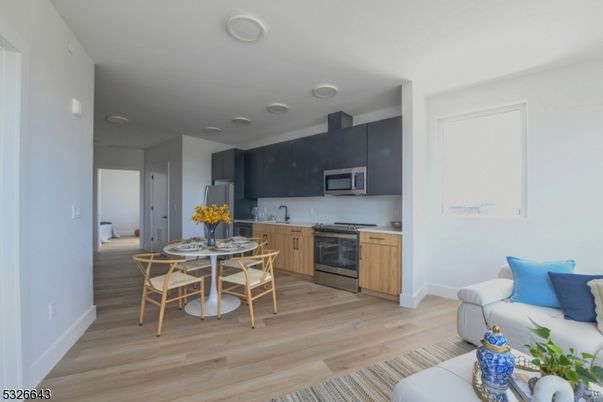Dining room, Interior, Kitchen, Living room, Stainless Steel Appliances, Wood Texture Flooring