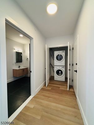 Bathroom, Interior, Recessed Lighting, Utility Closets, Washer, Wood Texture Flooring