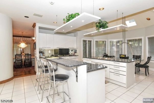 Chandelier, Dining room, Interior, Kitchen, Pendant Lights, Recessed Lighting, Stainless Steel Appliances