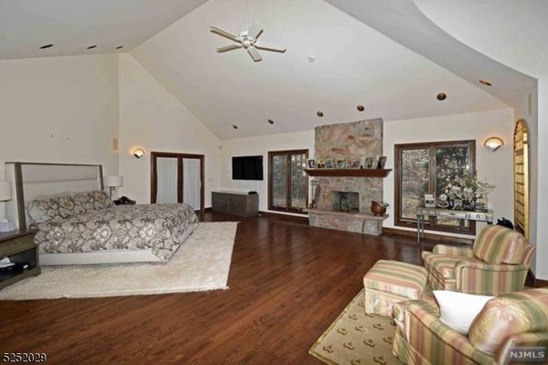 Bedroom, Fireplace, Interior, Living room, Recessed Lighting, Wood Texture Flooring