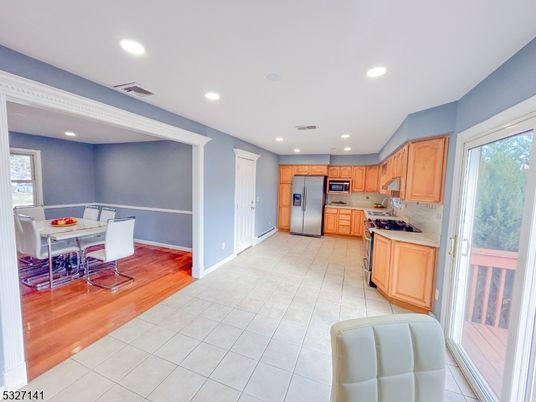 Dining room, Interior, Kitchen, Recessed Lighting, Stainless Steel Appliances, Wood Texture Flooring
