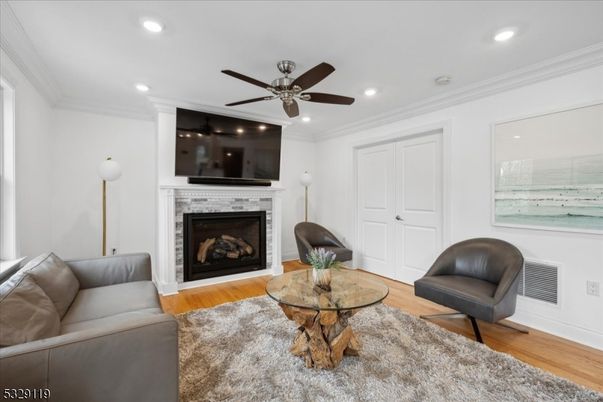 Fireplace, Interior, Living room, Recessed Lighting, Wood Texture Flooring