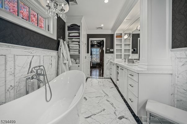 Bathroom, Dual Sink Vanities, Free Standing Baths, Interior, Marble, Marble Walls, Recessed Lighting