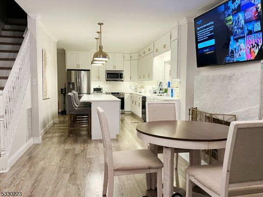 Dining room, Interior, Kitchen, Pendant Lights, Stainless Steel Appliances, Wood Texture Flooring