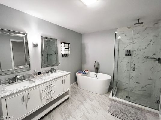 Bathroom, Dual Sink Vanities, Free Standing Baths, Glass Shower, Interior, Marble, Marble Walls