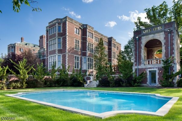 Exterior, Facade, Brick Facade, Pool, Condo Building