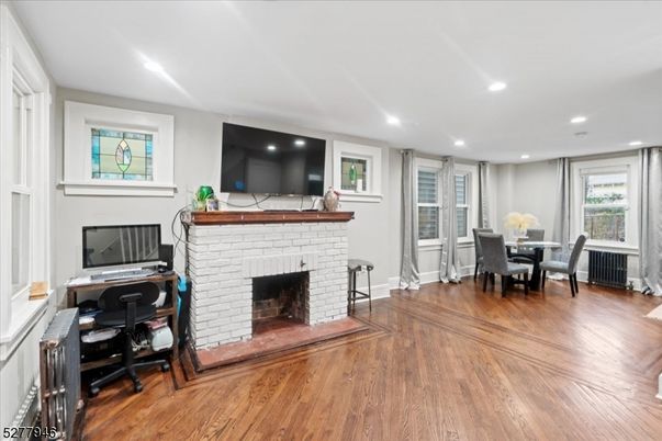 Fireplace, Home Office, Interior, Recessed Lighting, Wood Texture Flooring