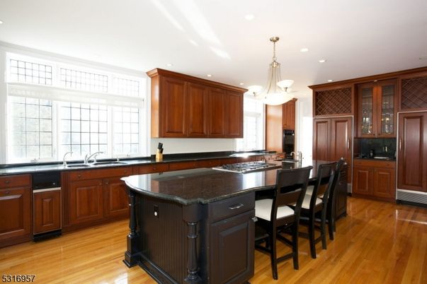 Chandelier, Interior, Kitchen, Pendant Lights, Recessed Lighting, Stainless Steel Appliances, Wood Texture Flooring