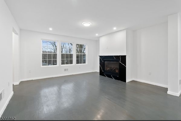 Empty room, Fireplace, Interior, Recessed Lighting, Wood Texture Flooring