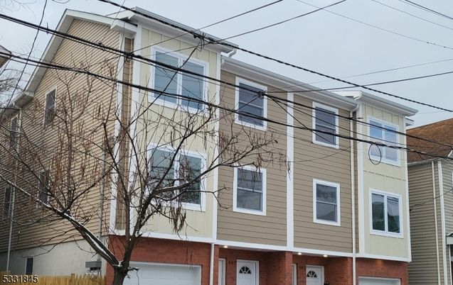 Attached, Exterior, Facade, Brick Facade, Rowhouse