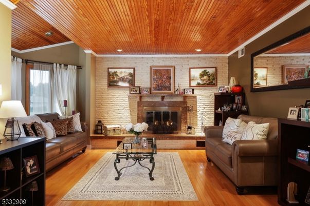 Fireplace, Interior, Living room, Recessed Lighting, Stone Walls, Wooden Ceilings, Wood Texture Flooring