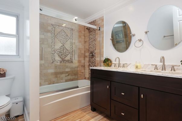 Bathroom, Dual Sink Vanities, Glass Shower, Interior, Stone Walls, Wood Texture Flooring