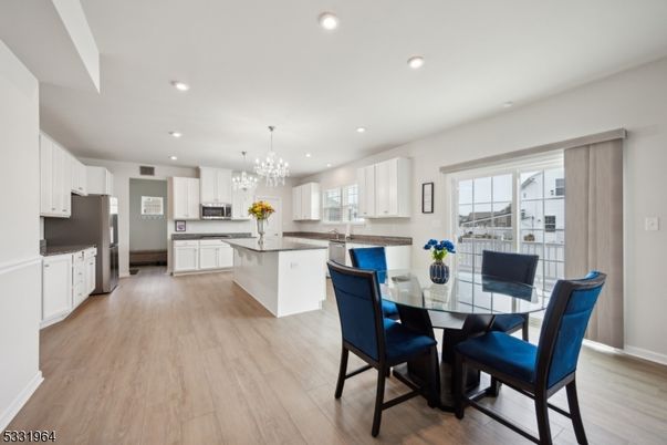 Chandelier, Dining room, Interior, Kitchen, Pendant Lights, Recessed Lighting, Wood Texture Flooring