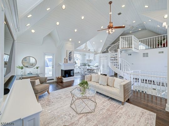 Dining room, Fireplace, Interior, Living room, Recessed Lighting, Wood Texture Flooring