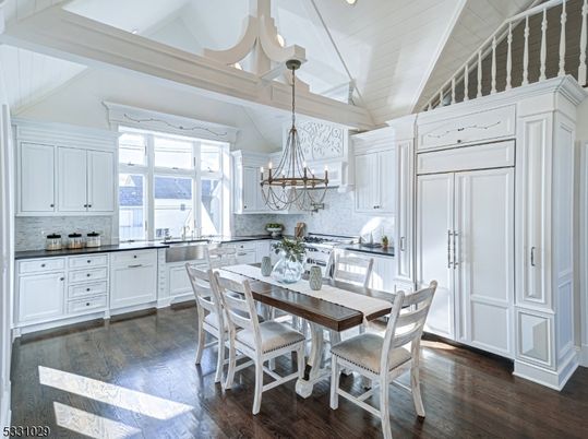 Chandelier, Dining room, Interior, Kitchen, Recessed Lighting, Stainless Steel Appliances, Wood Texture Flooring