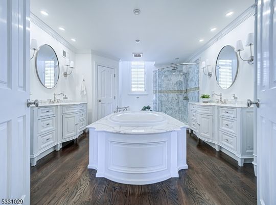Bathroom, Dual Sink Vanities, Glass Shower, Interior, Recessed Lighting, Wood Texture Flooring