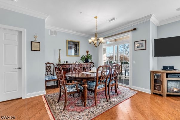Chandelier, Dining room, Fireplace, Interior, Wood Texture Flooring