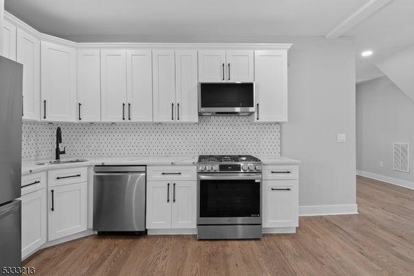 Interior, Kitchen, Recessed Lighting, Stainless Steel Appliances, Wood Texture Flooring