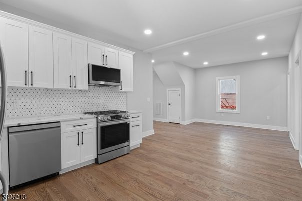 Interior, Kitchen, Recessed Lighting, Stainless Steel Appliances, Wood Texture Flooring