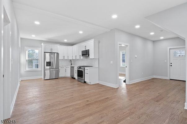 Interior, Kitchen, Recessed Lighting, Stainless Steel Appliances, Wood Texture Flooring