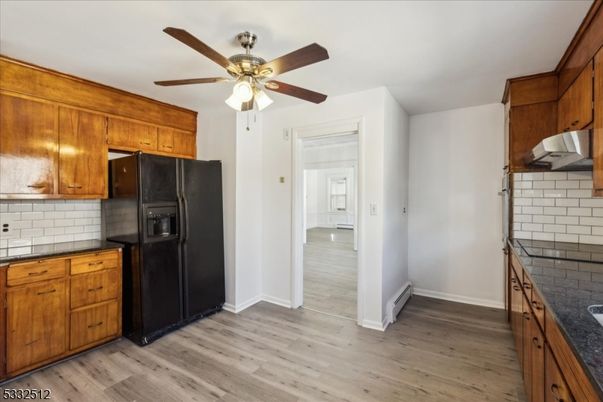 Interior, Kitchen, Tile Countertops, Wood Texture Flooring