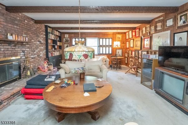Dining room, Fireplace, Interior, Living room, Pendant Lights, Stone Walls, Wooden Beams