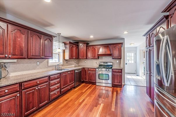 Interior, Kitchen, Pendant Lights, Recessed Lighting, Stainless Steel Appliances, Wood Texture Flooring