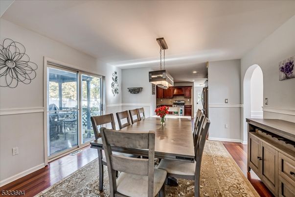 Dining room, Interior, Kitchen, Pendant Lights, Recessed Lighting, Stainless Steel Appliances, Wood Texture Flooring
